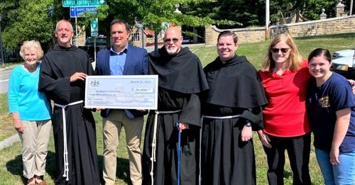 Burns check presentation at Dorothy Day