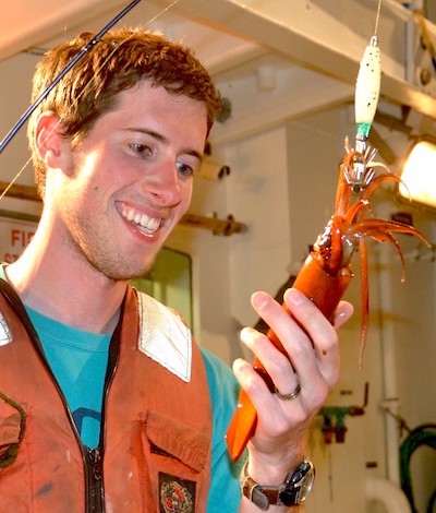 Birk examining a crustacean