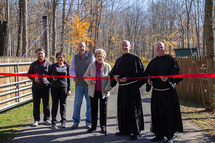 Ribbon Cutting participants at Blessing and Dedication