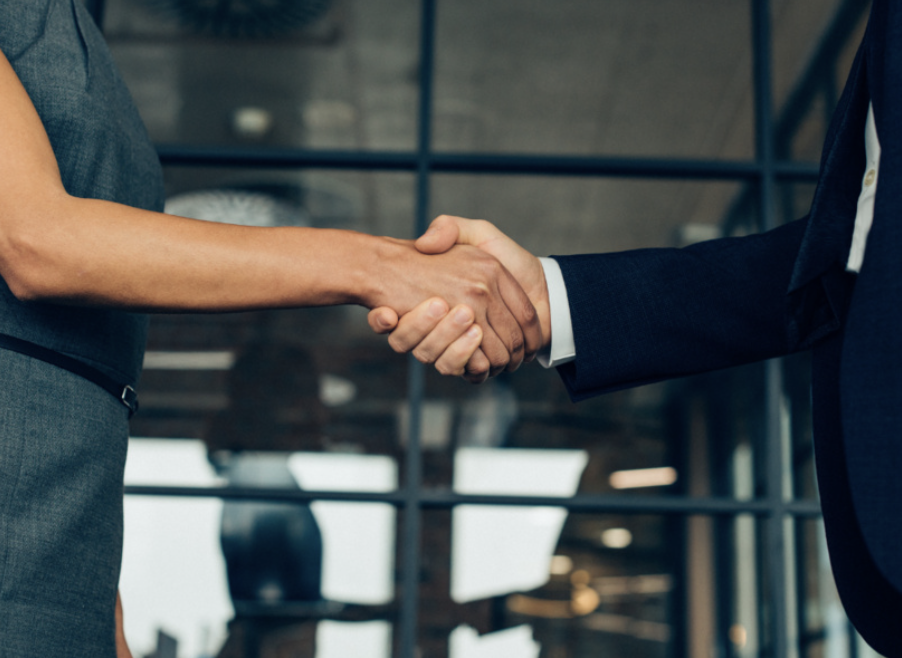 handshake between 2 professionals