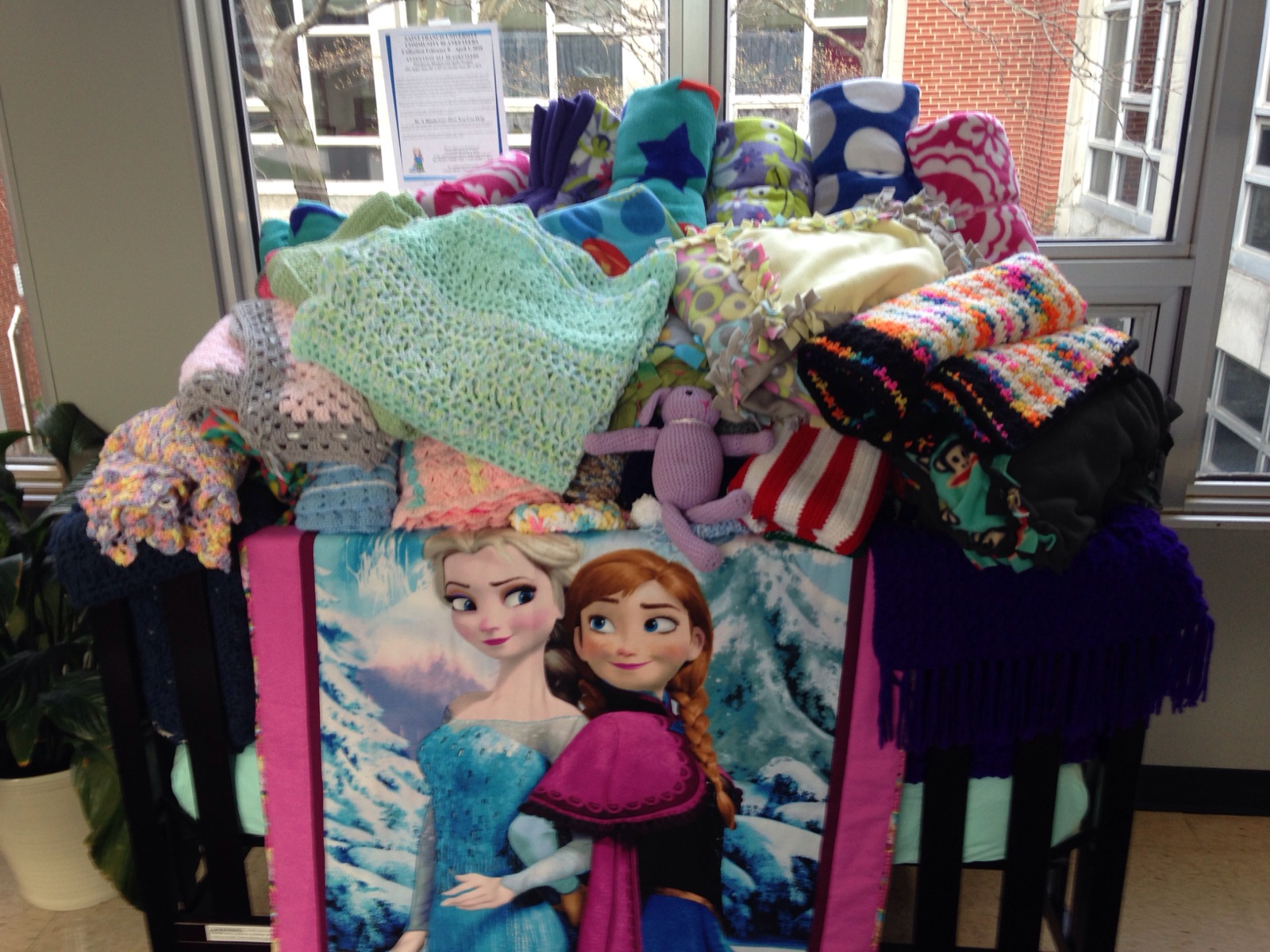 Blanket Donations pictured in crib