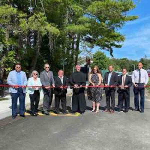 Officials cutting ribbon at St Catherine Street