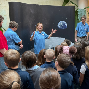 Earth to Moon Exhibit Faculty Presenting to School Group