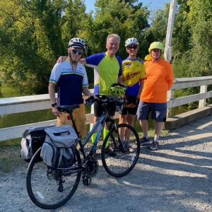 Br. Shamus poses for photo with fellow bikers