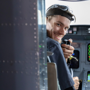 explore aviation careers - student in cockpit