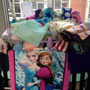 Blanket donations in crib