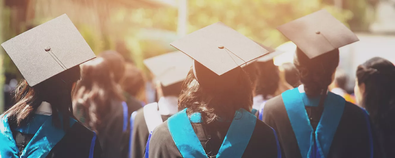 Graduates in caps and gowns 