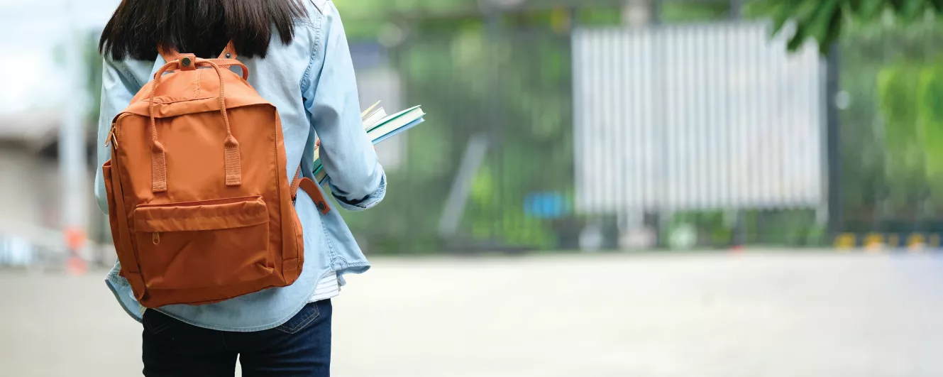 Student walking on campus