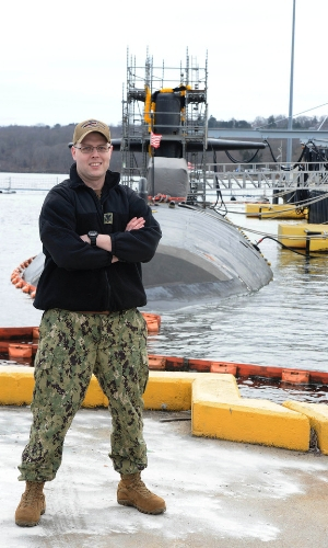 Mike Amenti in front of USS Pittsburgh