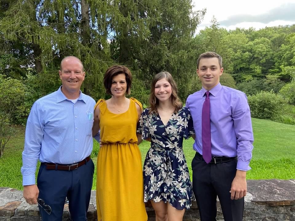 Angela with her husband and children